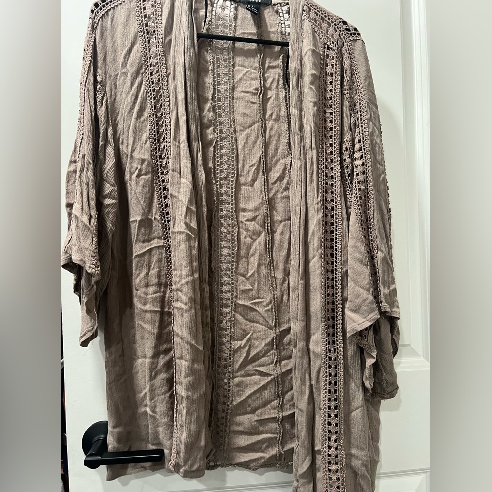 Tan oversized sweater. Perfect for over a bathing suit!